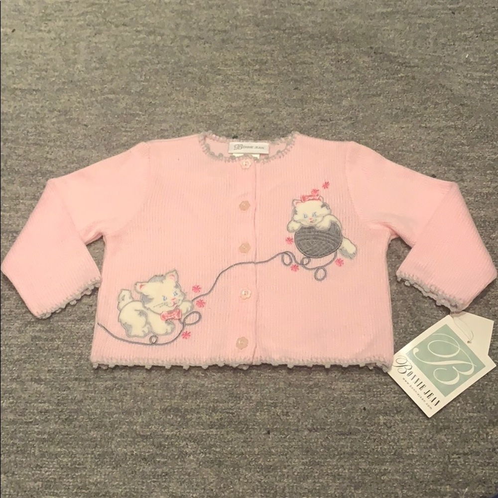 NWT Cardigan sweater with printed design